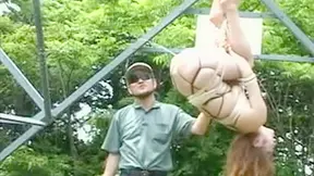 Submissive Woman Pleasured Outdoors by Her Dominant Master