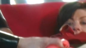 Redhead lesbian submissive gets toyed with and gagged