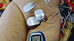 Dominatrix Nika plays with electric discharges on the genitals of the slave Electrostimulation BDSM