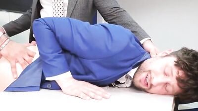 A new guy is being blow-banged by his colleagues in the office