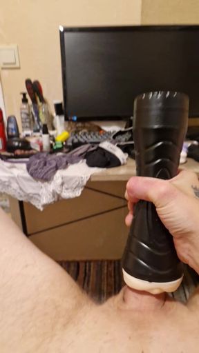 Young guy masturbating with fleshlight