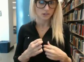 Hot camgirl masturbates in the library without worrying about the consequences