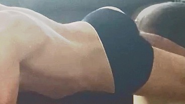 Retro September 6, 2021 Stretching in Tight Speedo Underwear Briefs on Table in Living Room