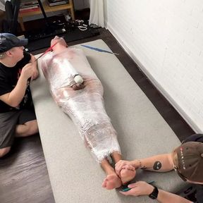 Matt and Ryder Stimulate Tickles On Mummified Pup Saki