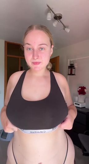 Amateur with big tits shows off her round ass