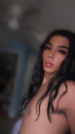 Petite trans teen shows off her perky ass