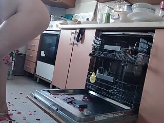 Sexy nude wife preparing food in the kitchen. Hairy brown hair, big ass, big tits.