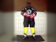 Rubber hockey pup pawing off