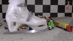 Toy cars and toy stuff under ice skating shoes floor view