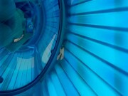 Mirrored floor in public tanning booth
