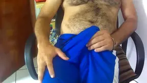 Guy Next Door Massages Dick in Blue Shorts for Sensual Relief