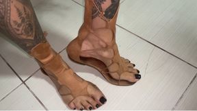sensualizing with leather sandals