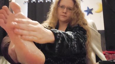 Rubbing exfoliating cream on my feet