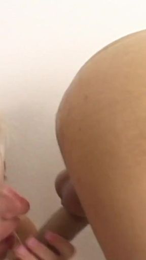 Angela Stone takes two cocks and blows them up