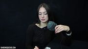 [8] (ASMR, with microphone) Lesya is smoking all-white Winston cigarette, sometimes smoking hands-free (dangling), flicking the ash into the ashtray |