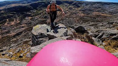 Risky climb up the mountain with a drone watching while she deepthroats and gags on thick cock