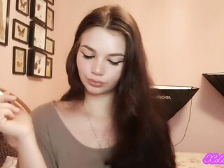 Teen latin chick brunette hair with blue eyes teases u with slow, seductive smokin'