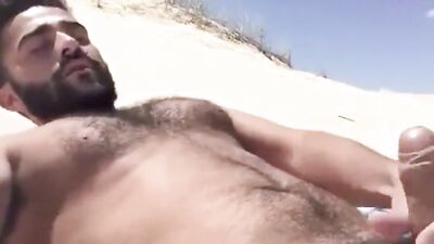 Bold Arabic Stallion Pleasures Himself on the Beach and Cums