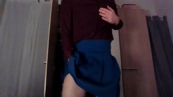 Sexy crossdresser secretary in a hot silk shirt teasing and touching