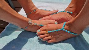 Playing footsie outside wearing barefoot sandals