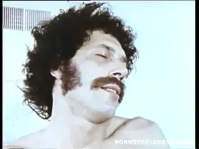 Classic porn star John Holmes in a big orgy with fellow legends
