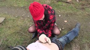 Brunette babe is blowing his lover's cock outdoors
