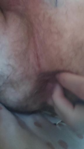 The slave plays with his fingers in front of the master