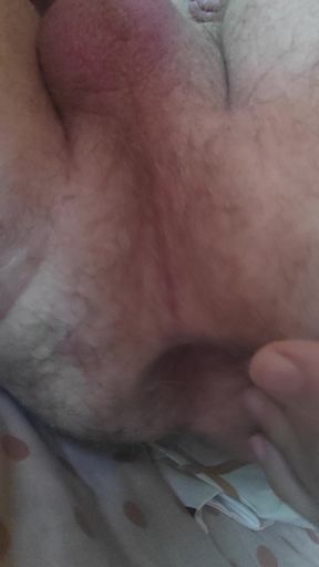 The slave plays with his fingers in front of the master