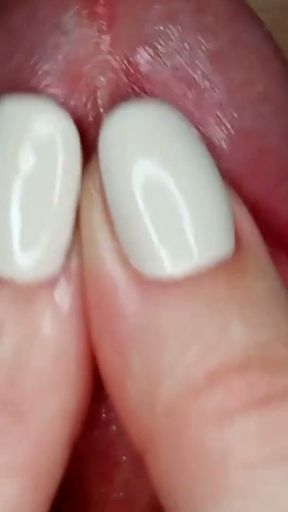 She caresses his frenulum and he quickly cums.   Clip 1