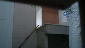 Toilet catches a cute Asian chick taking a piss