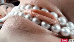 Finally found the GIF porn images I often see, featuring pearls inserted into a pink vagina and rubbing against it