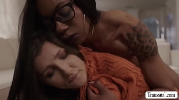 Bad brunette fucks Ebonys ass while playing