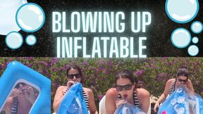 In swimwear by the pool, watch as I struggle for 5 minutes to blow up this float!
