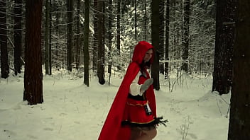 Red Hood in the snowy forest