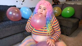 Blowing up balloons in every colour of the rainbow with BBW Daisy