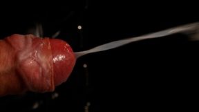 Extreme close-up macro cumshot in slowmotion