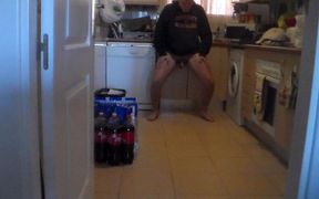 John is pissing all over the kitchen floor