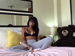 Bored brunette uses a vibrator to make her pussy dripping wet