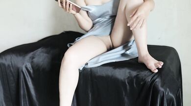 Indonesian girl with a plump butt is very sexy in a satin dress