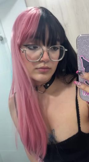 Pink hair, glasses, and phone