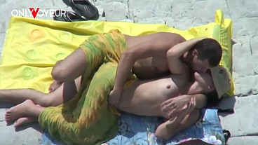Beach Voyeur. Licking pussy in the waves of the surf and fucking under the sun