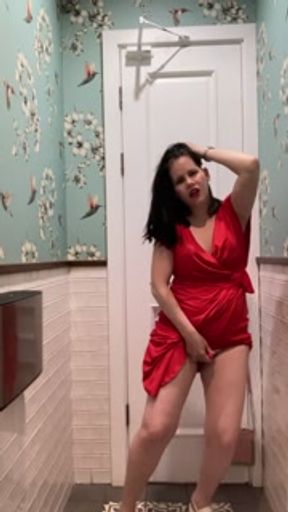 Hot brunette in red dress masturbates in a public restaurant