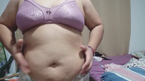 Mi panza en cámara lenta- ondas, movimientos y golpes.