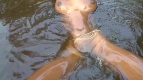 Hot african ebony girl with nice tits has a stroll around her village naked