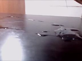 She-babe cums on the table and licks her jizz