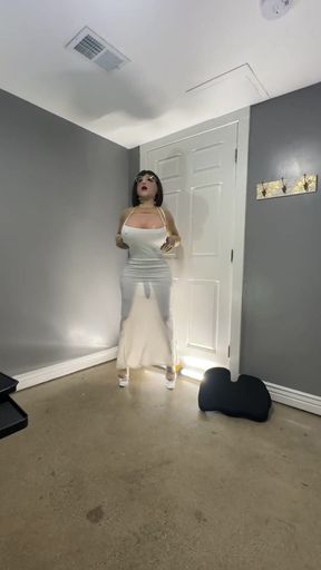 Iconic moment from &quot;Hot trans cd in cute white dress teasing huge tits and ass&quot;