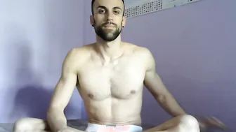Solo twink strokes his big uncut cock and cums in his own mouth