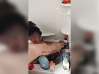 Nice-looking girl gives kitten a bathroom