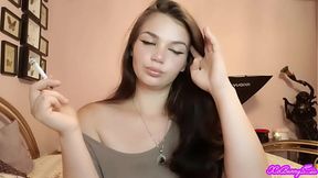 XO Bunny brunette latina with blue eyes smoking blowing smokein your face