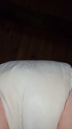 Diaper girl pees thick diaper